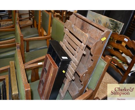 A folding chair; a pine shelf; and two wooden trays 