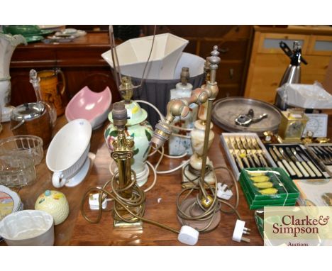 A Maling lustre table lamp; a Studio pottery type lamp; a brass adjustable lamp; an onyx table lamp; and a Corinthian column 