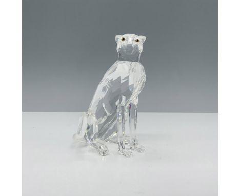 Amazing figure of a cheetah with a crystal clear faceted body and yellow brown eyes. This figure was part of the African Wild