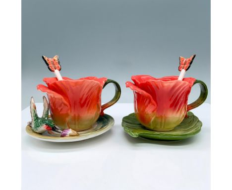Handmade pair of porcelain teacups in a floral petal design with a vibrant orange and green gradient. Each teacup is paired w