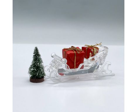 Features a crystal sleigh with 2 wrapped presents and a small tree. This item has its original box measuring 6"L x 6"W x 6"H.
