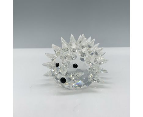 Adorable crystal clear figure that depicts a hedgehog with an oval shaped body and around 57 spines. This figure was part of 