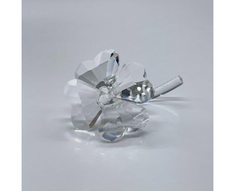 This gleaming lucky clover is make up of faceted clear crystal on a smooth crystal stem. This item has its original box measu