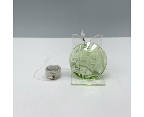 This beautiful light peridot green crystal ornament was given to members renewing their membership or those just joining the 