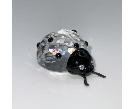 This adorable ladybug was part of the In the Secret Garden theme group. It features a faceted crystal body with contrasting b