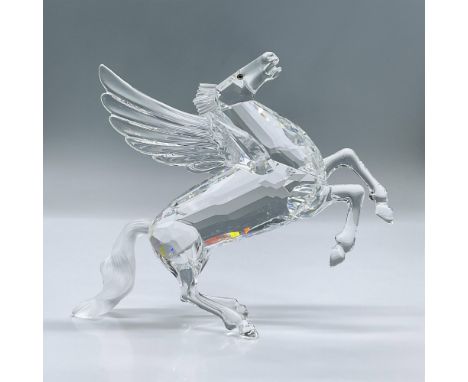 This figure was designed to stand on the hind legs and tail, it is made predominantly from clear crystal, with a frosted mane