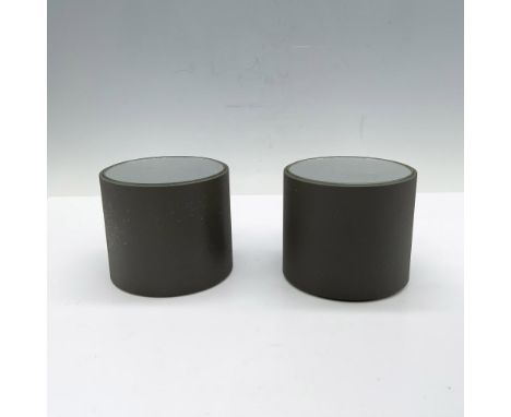 Incredible and useful duo of circular display stands with a mirrored top. Battery operated to revolve. This item has its orig