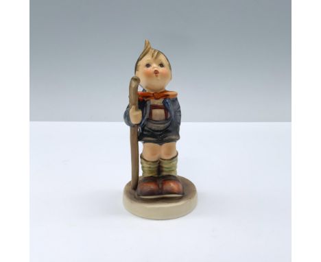 Young boy dressed for hiking, holding his walking stick. Goebel Hummel backstamp. Issued: 20th centuryDimensions: 2"W x 4.25"