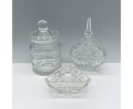 Amazing three piece set that consists of a footed pinwheel candy dish with a lid, a barrel shaped candy jar with a lid, and a