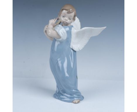 Glossy finish. Figure of an angel holding a string instrument. Lladro backstamp. This item has its original box. Box measures