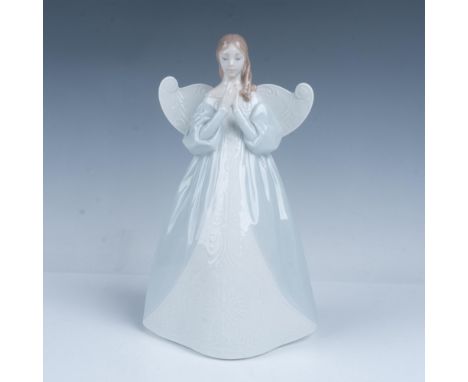 Glossy finish. Figure of an angel holding a little pink flower. Lladro backstamp. This item has its original box. Box measure