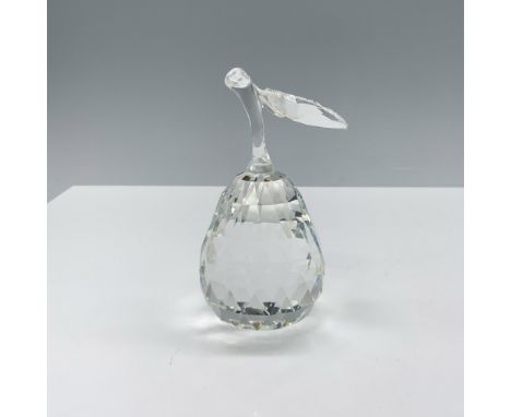 Beautiful crystal clear faceted figure that depicts a fruit with a stem and a single leaf. This figure was part of the Sparki