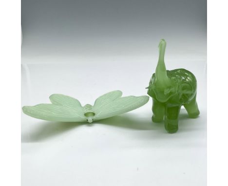 Adorable green figure with trunk up, ears back and tusk prominent (3.5"L) accompanied by Vaseline glass figure with dark gree