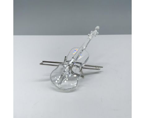 Spectacular crystal clear figure that depicts a beautiful violin with frosted accents and a rhodium metal bow that doubles as