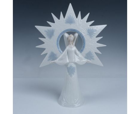 Glossy finish. Figure of an angel in front of a large starburst. Lladro backstamp. This item has its original box. Box measur