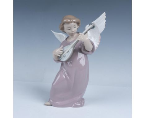 Glossy finish. Figure of an angel in a purple rope holding a bandola. Lladro backstamp. This item has its original box. Box m