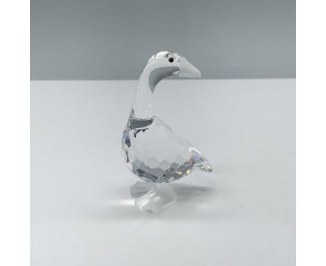 Lovely crystal clear faceted figure that depicts a long necked goose with a frosted beak and feet. This figure was part of th