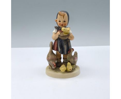Matte hand painted porcelain figurine featuring a young girl feeding a chicken family. Goebel TMK4. M.I. Hummel impressed. Go