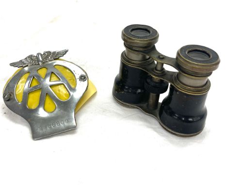 Pair of vintage binoculars le jockey club and a vintage AA car badge 