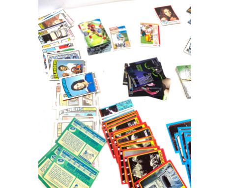 Large selection of vintage collectors cards includes t2 topps, ghost buster ii collectors cards, star wars merlin cards, batm