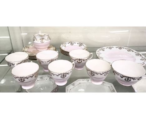 Royal Vale bone china tea service includes 6 cups 6 small plates 1 large serving plate 1 sugar bowl 1 milk jug, some damage 