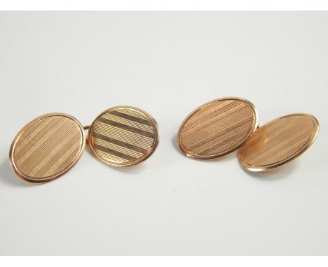 A pair of 9ct rose gold gentleman's cufflinks, with engine turned design, 7g.