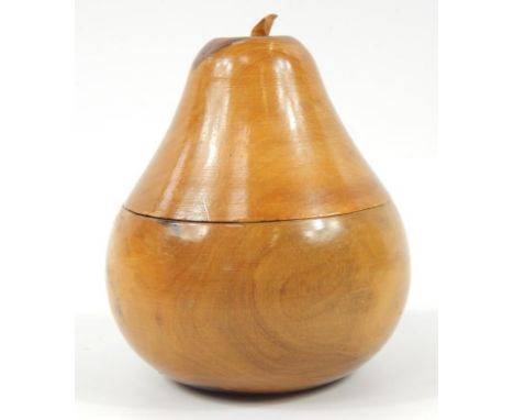 A walnut tea caddy, in the shape of a pear, 12cm high.