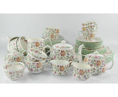 Mintons Haddon Hall pattern part dinner and tea service, comprising bowls, dinner plates, side plates, saucers, cups, sugar b