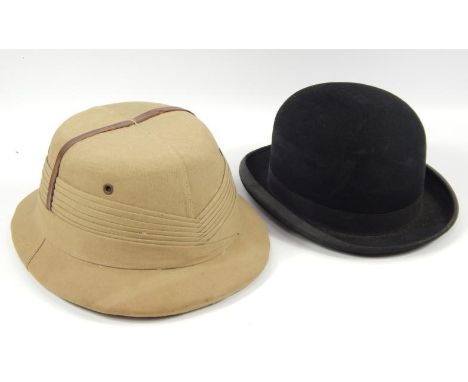 Two gentlemans hats, comprising a pith helmet/topee by Shavearsh of Khartoum, and a bowler hat by G R Dunn of London.