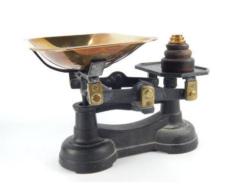 Cast iron and brass kitchen scales.
