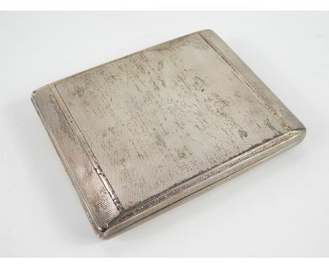 A 1920s silver cigarette case, with engine turned decoration, import marks for London 1928, 3 1/2oz.