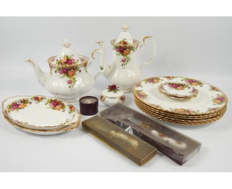 Royal Albert Old Country Roses, a selection of items comprising teapot, coffee pot, dinner plates, serving knives, candy box,