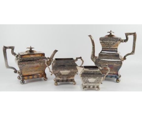 An early 20thC silver plated tea and coffee service, comprising teapot, coffee pot, sugar bowl and milk jug, all of square fo