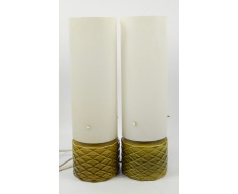 A pair of mid 20thC ceramic and plastic table lamps, 33.5cm.