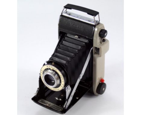 A Kodak Junior II folding camera, with case.