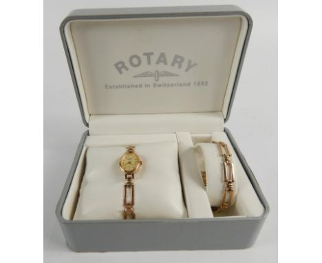 A 9ct gold Rotary Elite wristwatch, with matching bracelet, all in 19.6g.