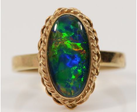 A 9ct gold opal triplet dress ring, 14mm x 7mm opal, P, 3.6g