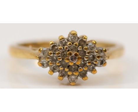 A 9ct gold diamond cluster ring, stated 0.25ct, J, 2.4g