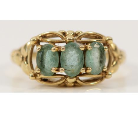 A 9ct gold emerald three stone dress ring, S, 2.9g