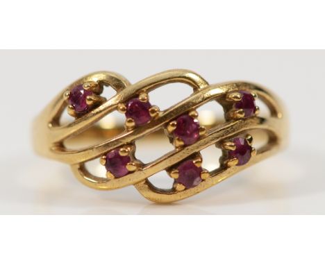 A 9ct gold ruby open work dress ring, N, 2.8g