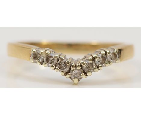 A 9ct gold brilliant cut diamond wishbone ring, K, 2g