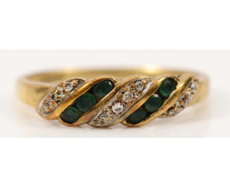 A 9ct gold emerald and diamond dress ring, P, 2g