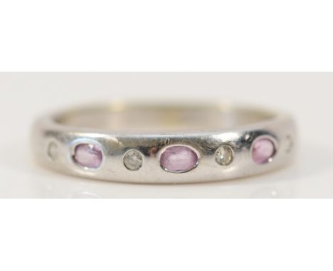 A 9ct white gold diamond and pink sapphire dress ring, M 1/2, 2.5g