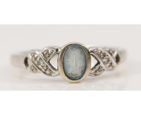 An unmarked 9ct white gold topaz and diamond dress ring, hallmarks missing, appears resized, L, 1.7g