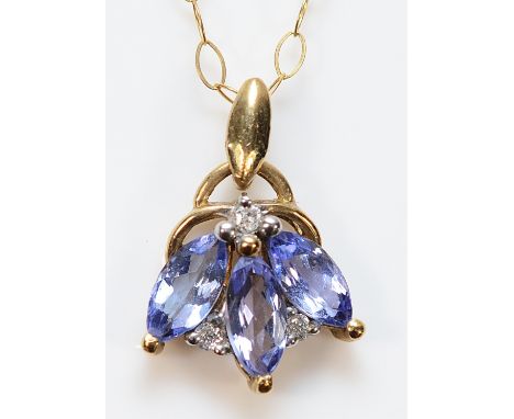 A 9ct gold tanzanite and diamond pendant on a chain, 1.2g