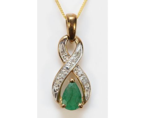 A 9ct gold emerald and diamond drop pendant on a chain, 20mm, 1.3g