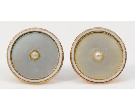 A pair of unmarked 9ct gold mother of pearl, enamel and seed pearl earrings, converted from shirt buttons, with scroll backs,