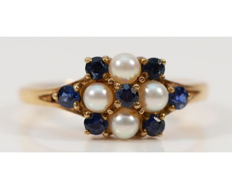 A 9ct gold sapphire and pearl cluster ring, O, 2.7g