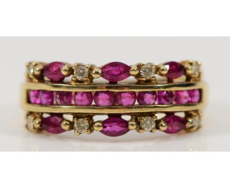 A 9ct gold ruby and diamond three row dress ring, P, 3.8g