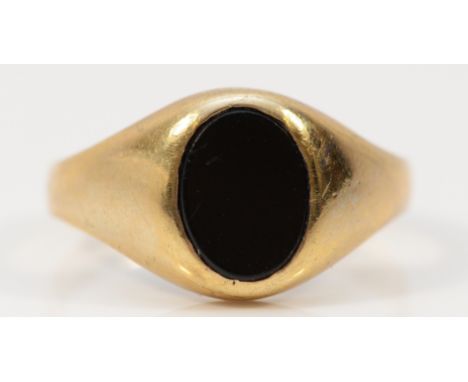A 9ct gold black onyx signet ring, M 1/2, 2.5g